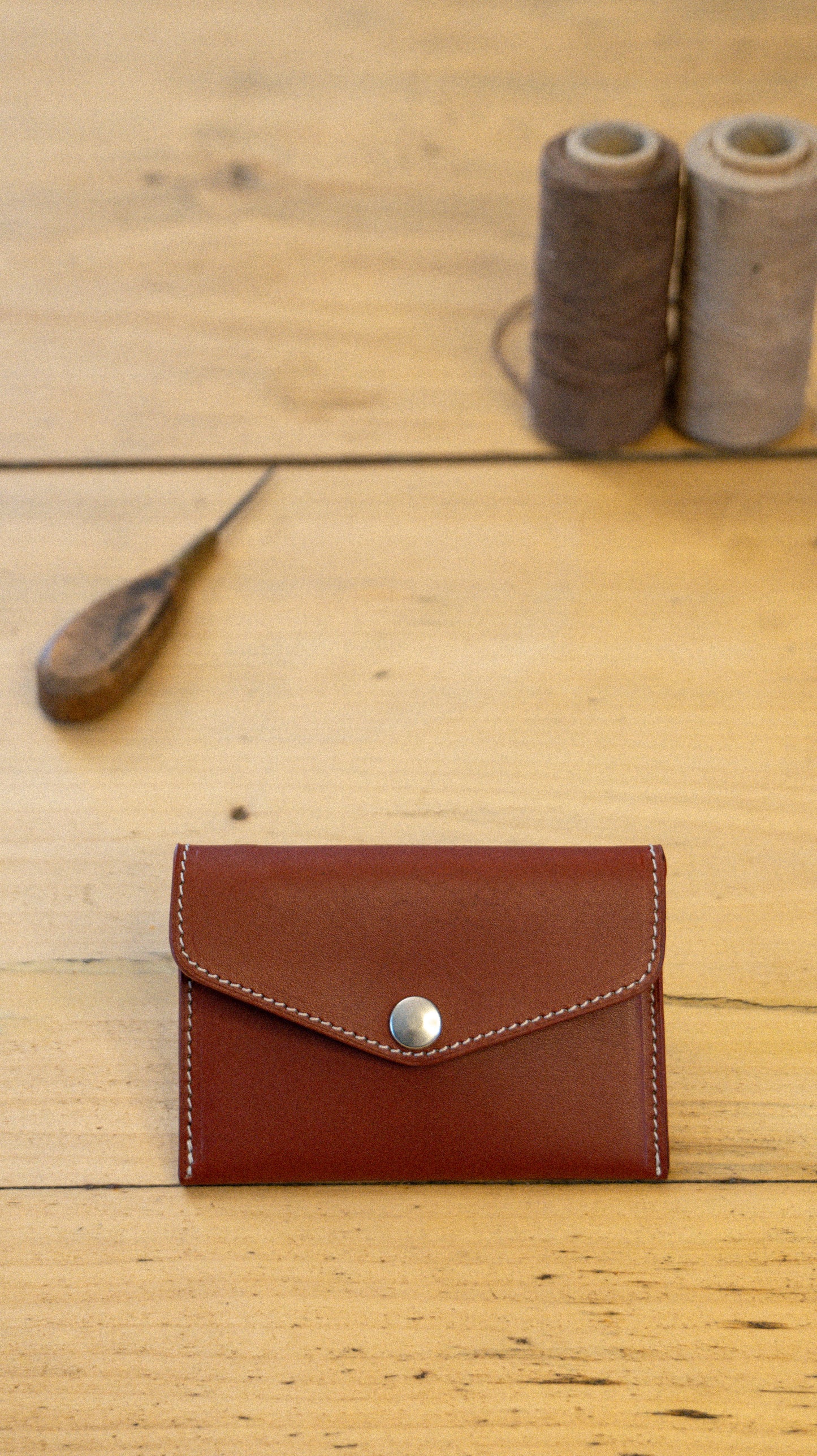 L'Essentiel - Porte-monnaie compact en cuir